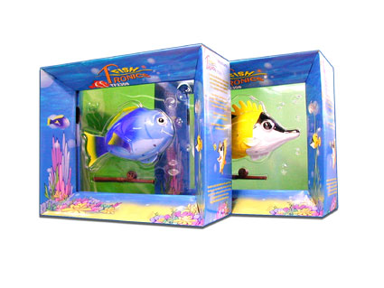 A photo showing a boxed blue tang version and a boxed angel fish version of the Fishtronics toys